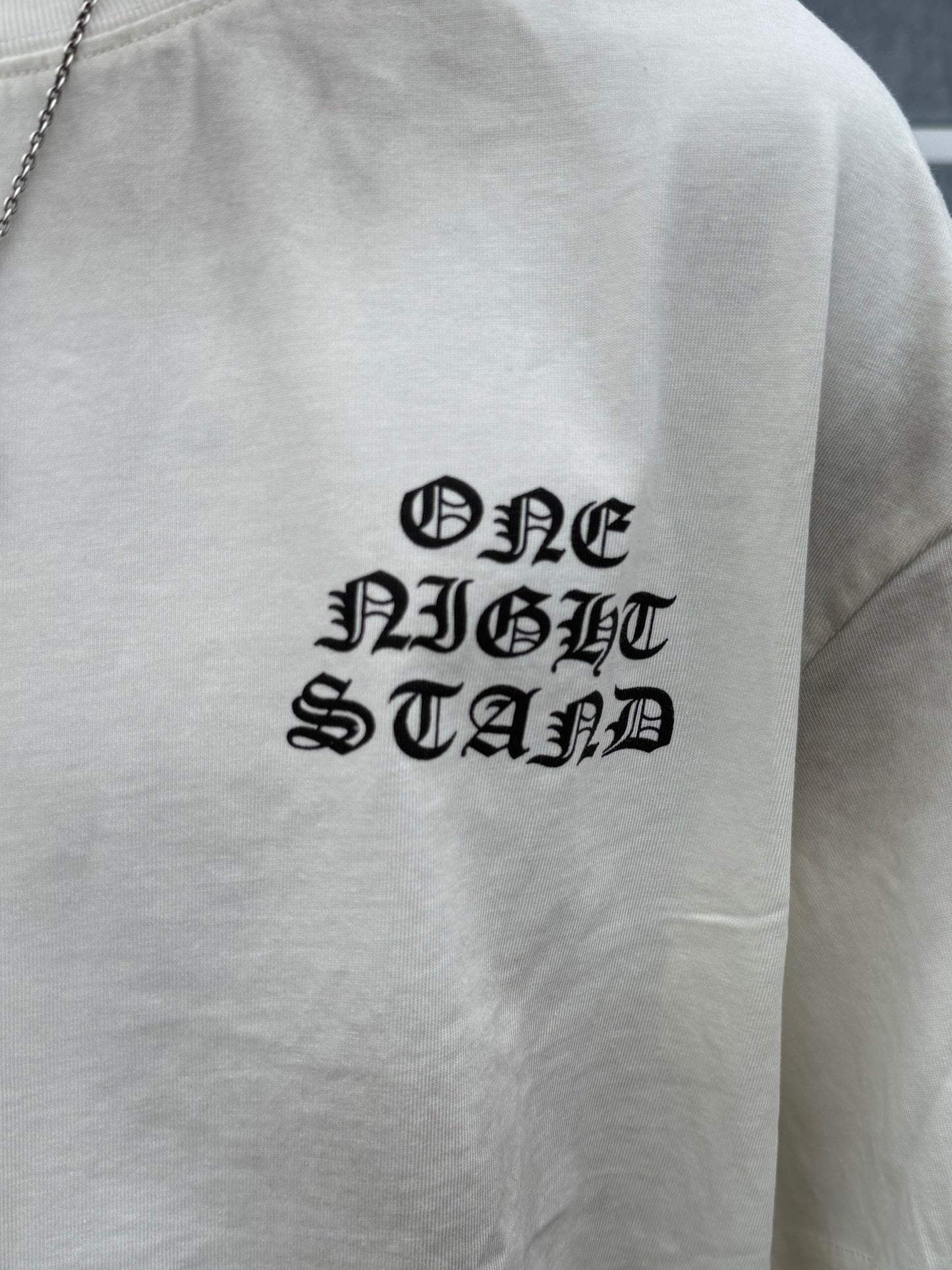 バックロゴペイントクロスTシャツ DPB90229