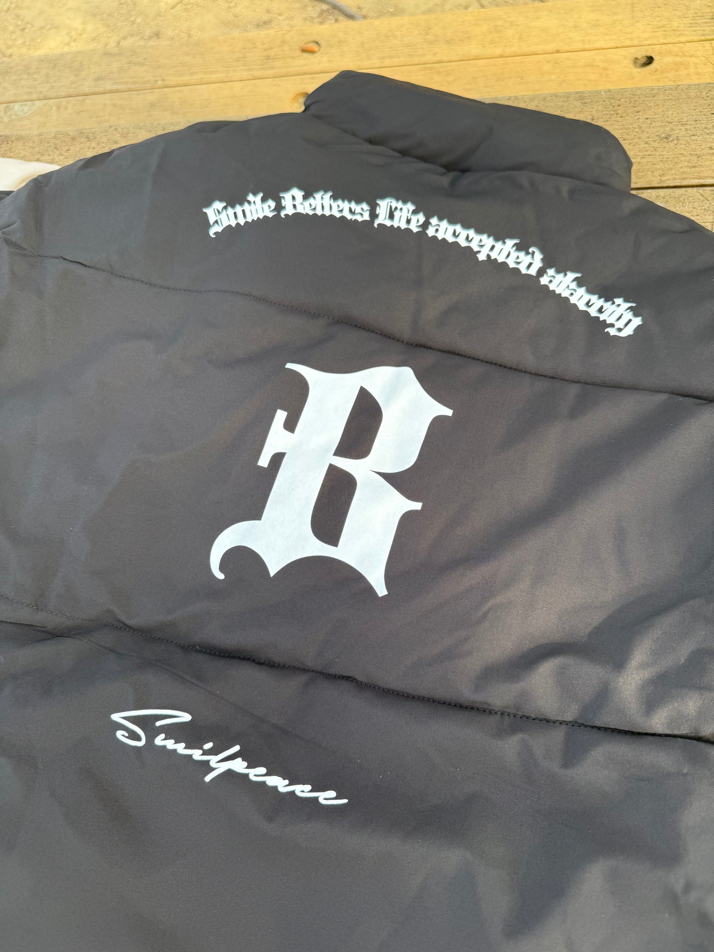 ユニセックスロゴダウン DPB73584